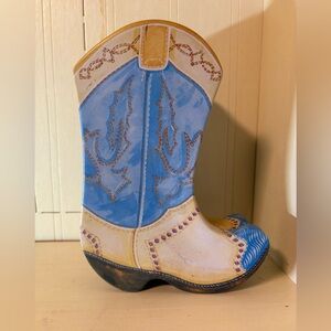 Cowboy boot tin. Pictures on inside and out.